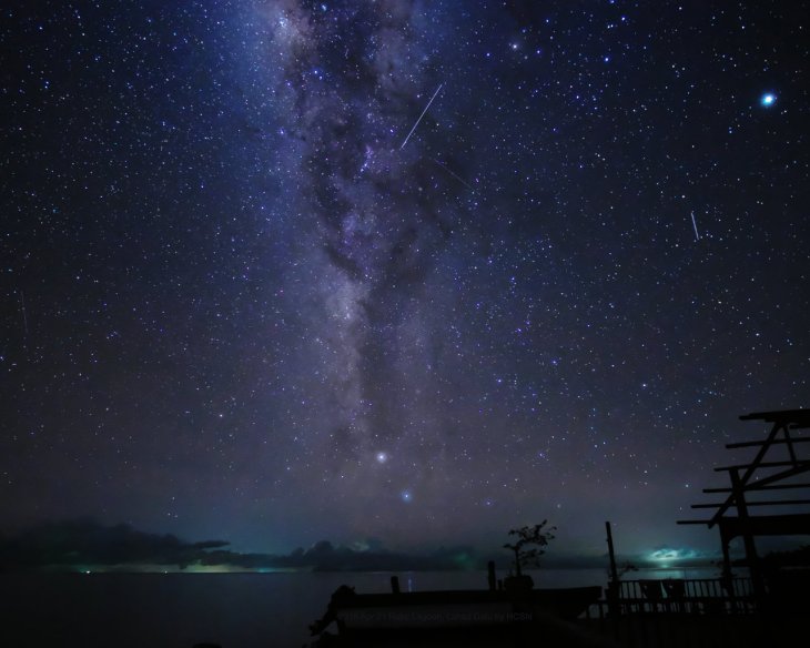 Milky Way, meteor and airplane light trails at Tebah Batang lagoon, Lahad Datu