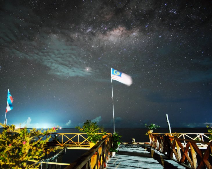 The Milky Way partially covered by passing cloud at Tebah Batang lagoon, Lahad Datu